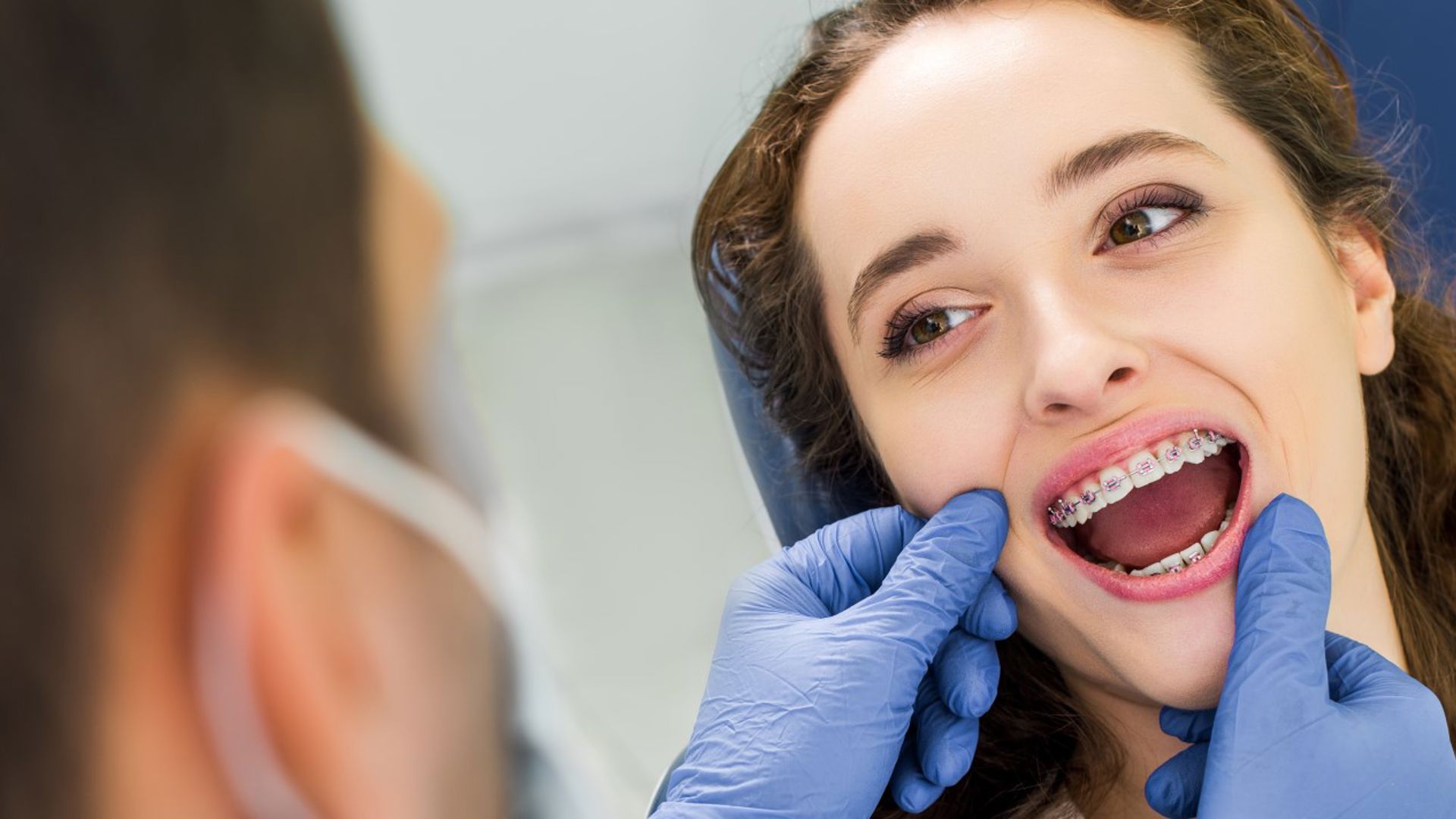 Girl using her orthodontics benefits with GMHBA
