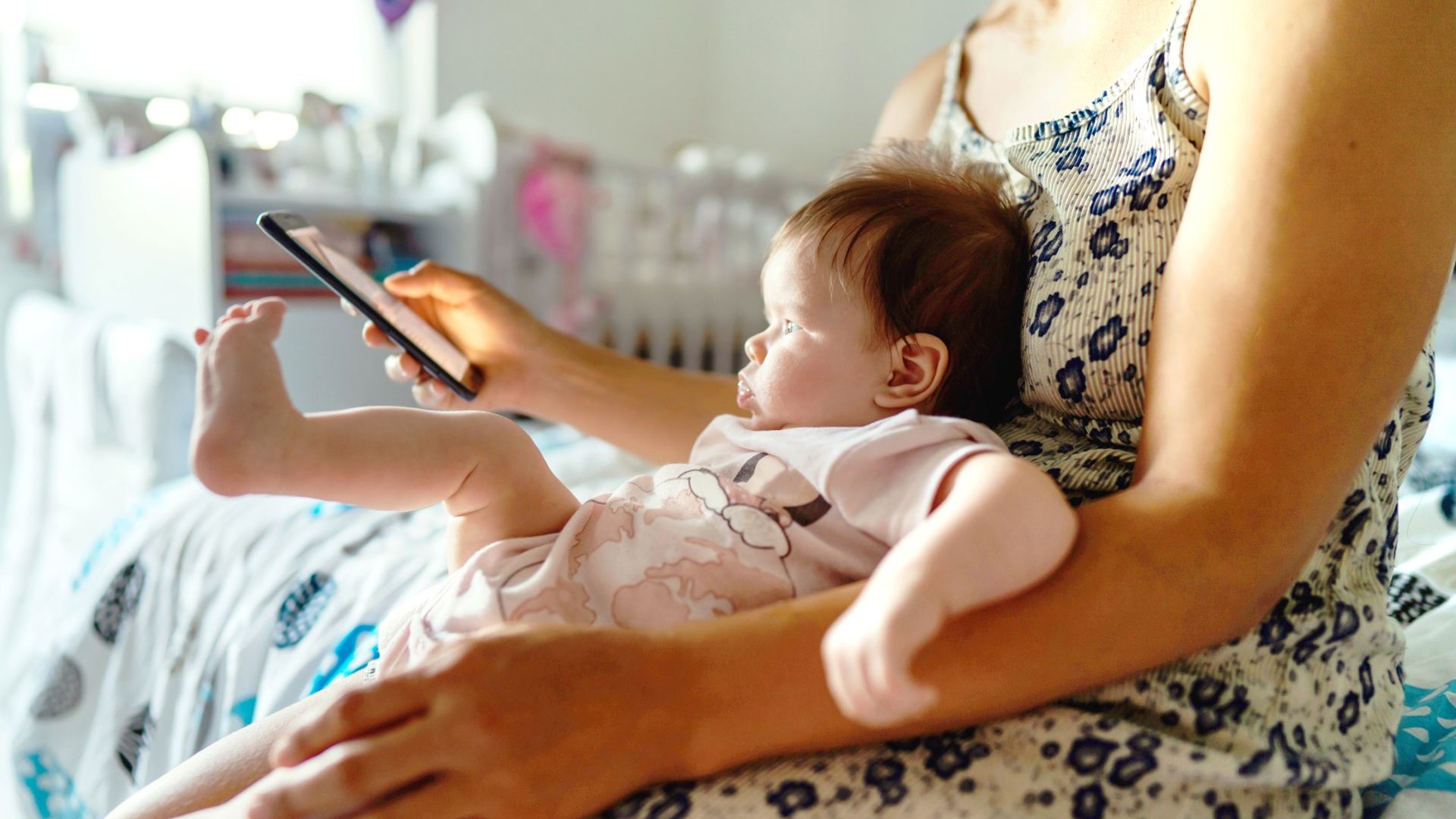 Woman adding newborn baby to health insurance