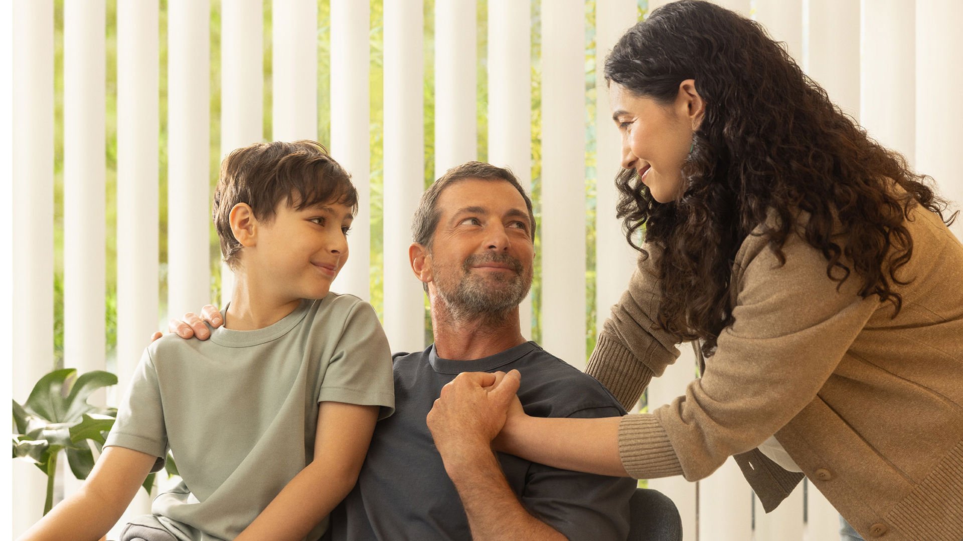 Family covered by GMHBA Health Insurance sharing a moment in hospital