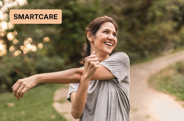 Woman smiling because she has SmartCare Starter Extras